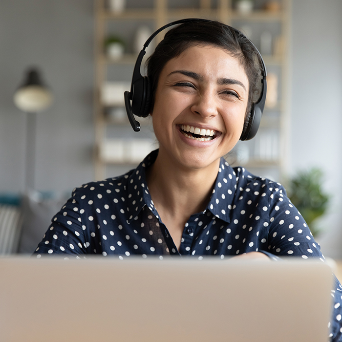 Person using a headset to communicate digitally